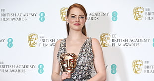 Emma Stone with British Academy Film Awards trophy