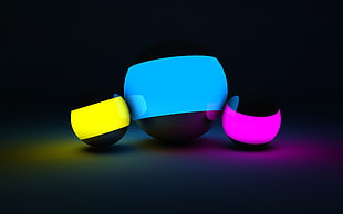 yellow, blue, and pink round lamps