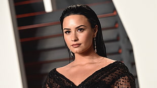 Demi Lovato in black v-neck top