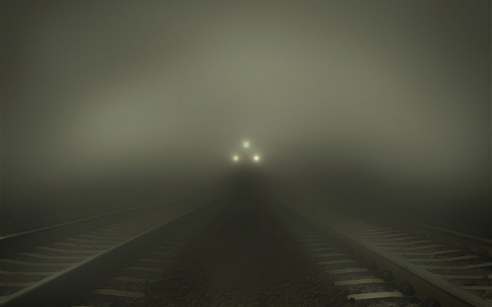silhouette of train covered by fog HD wallpaper
