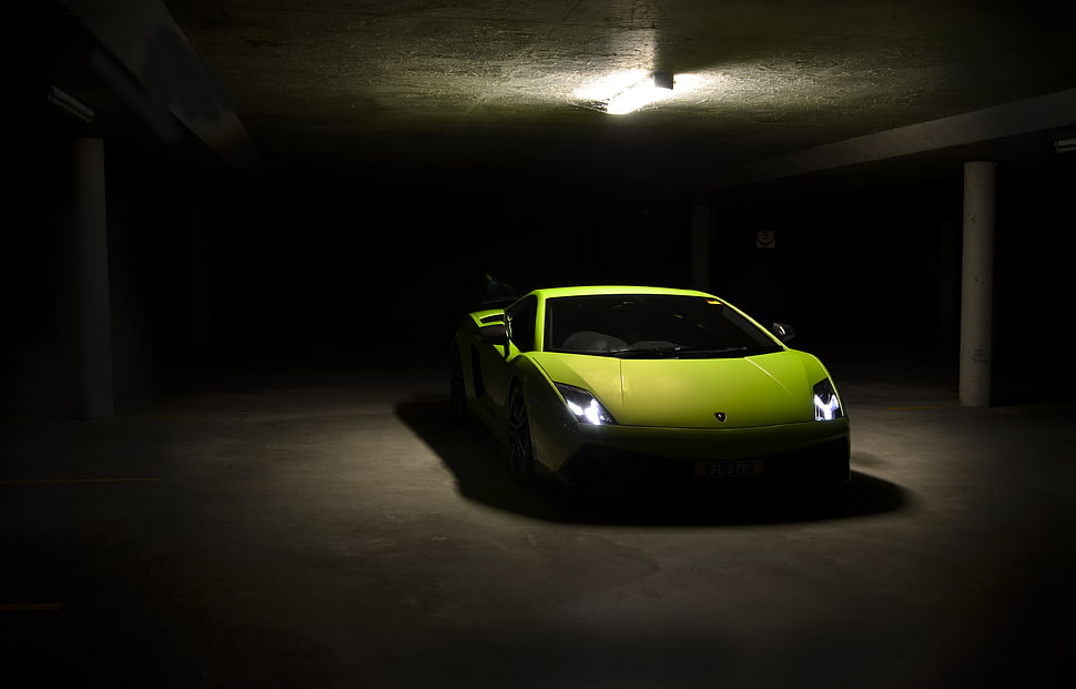 low light photography of green sports car HD wallpaper