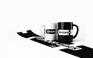 two black-and-white ceramic mugs, minimalism, cup, monochrome, simple background