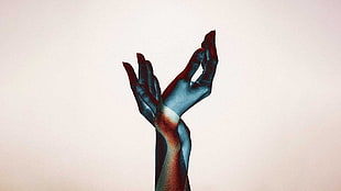 person's arms, hands, simple background, tooclosetotouch