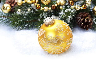 gold-colored and white floral bauble, New Year, snow, Christmas ornaments , depth of field