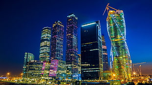 city skyline during nighttime HD wallpaper