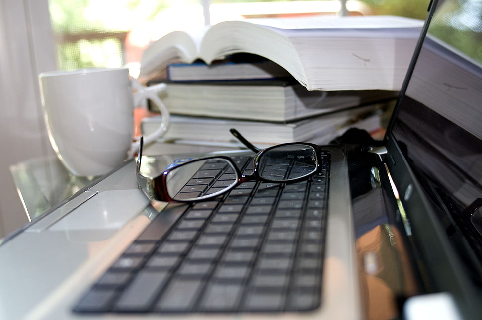 black framed eyeglasses on laptop HD wallpaper