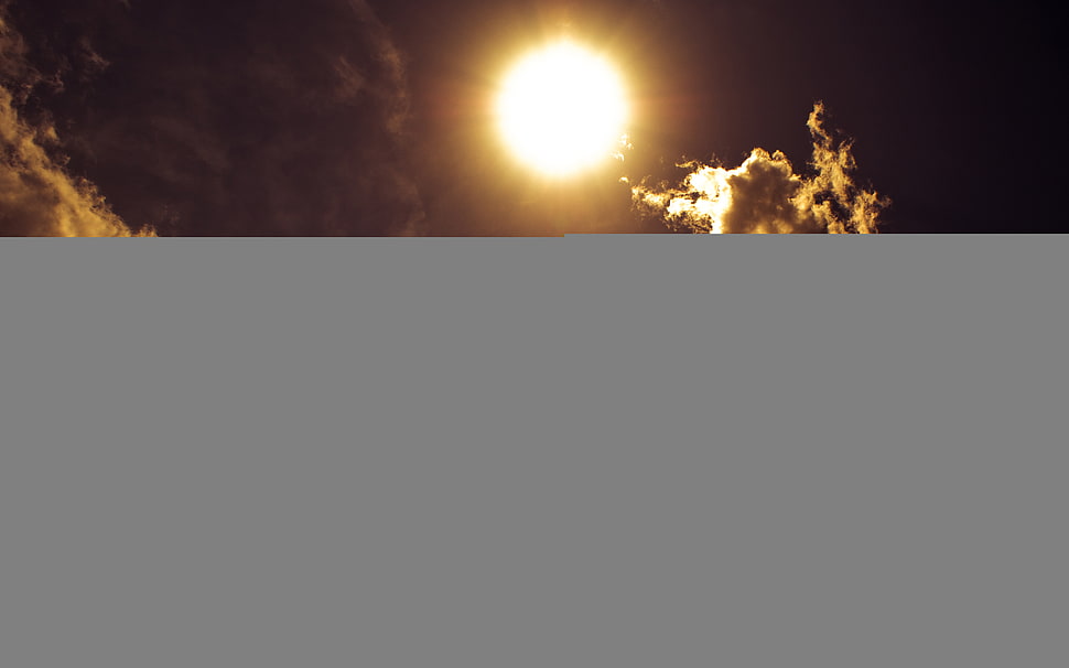cloudy under sunset HD wallpaper