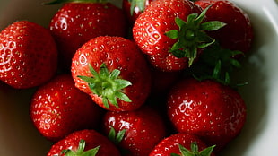high angle photography of Strawberries on bowl