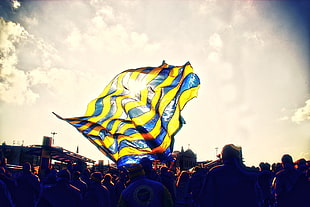 yellow and blue flag on air