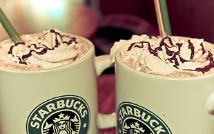 two Starbucks coffee mugs HD wallpaper
