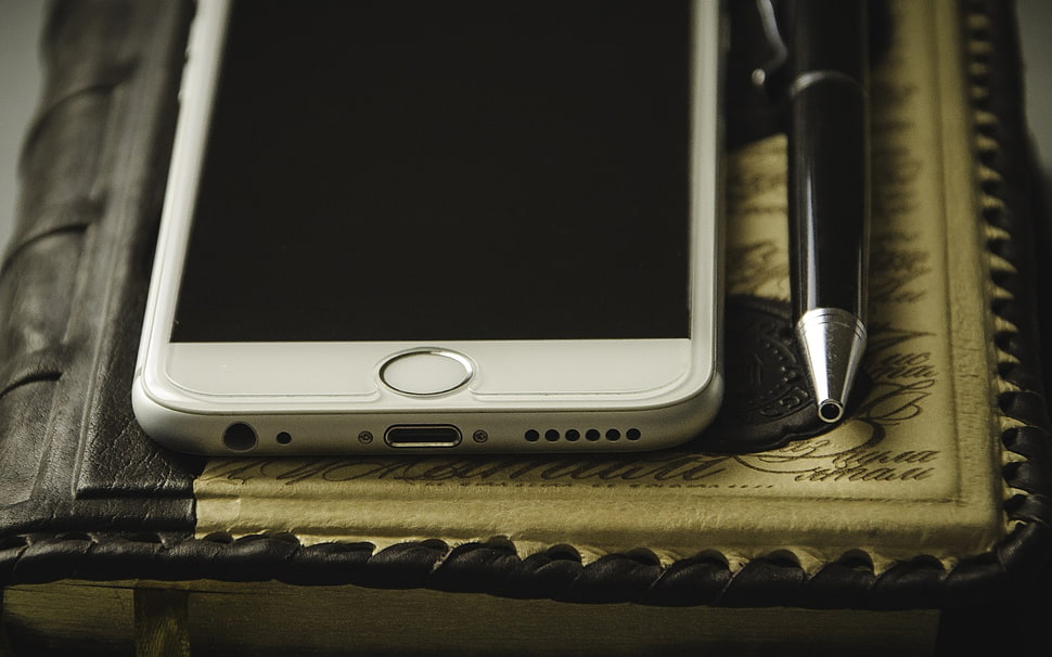 silver iPhone screen near pen HD wallpaper