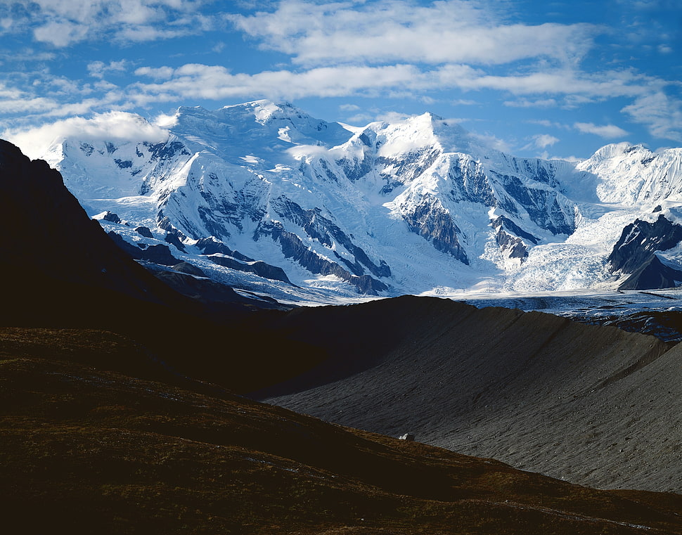 snow covered mountain under blue sky HD wallpaper