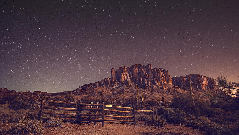 brown hill, desert, night, stars, rock HD wallpaper