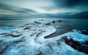 photograph of snow covered body of water HD wallpaper