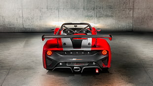 gray, black, and red Lotus sports car