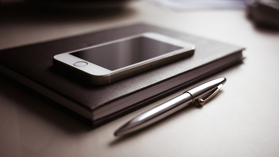 gold iPhone 6 and silver pen HD wallpaper