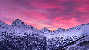 panoramic photo of snow-capped mountain during golden hour HD wallpaper