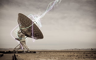 beige concrete satellite receiver, landscape, desert, neon, lights