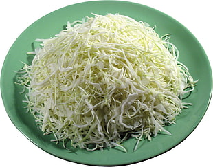 sliced green vegetable on green plate