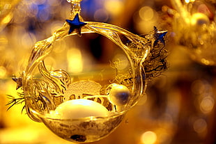 shallow focus on round silver-colored ornament