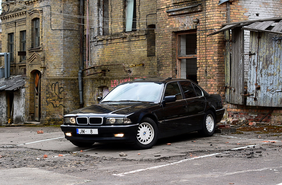 black BMW sedan HD wallpaper