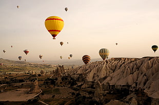 hot air balloons in the skies, cappadocia