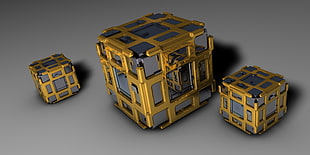three gold and gray puzzle cube illustration