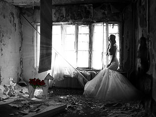 woman wearing white wedding dress inside abandoned house