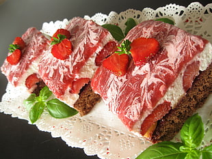 brown and pink sliced cake