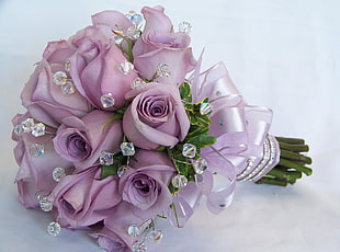 bouquet of pink roses on white surface