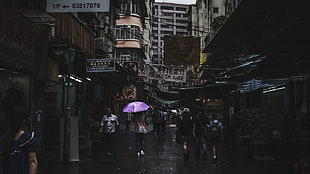 purple umbrella, city, people