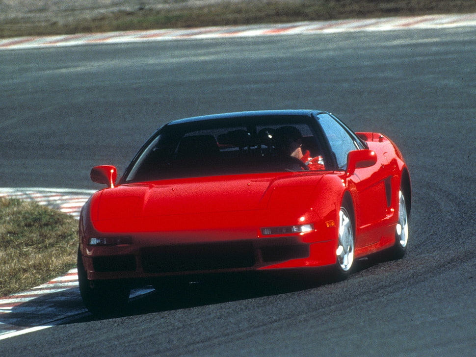 red coupe on gray road HD wallpaper