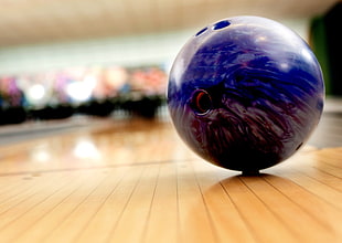 multicolored bowling ball on brown wooden floor HD wallpaper