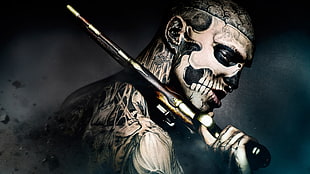 man with skeleton holding gun graphic