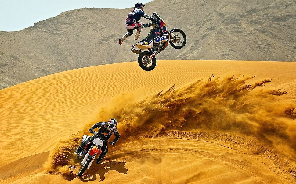 two man riding in motorcycle in desert during daytime HD wallpaper