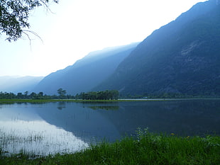 lake near hills during daytime HD wallpaper