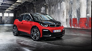 red and black BMW 3-door hatchback