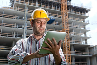 engineer looking at his tablet