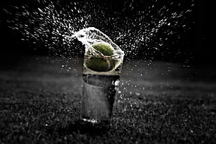 clear glass drinking cup, water, splashes, tennis, tennis balls