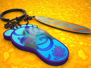 teal and purple flipflops and brown and blue surf board keychain