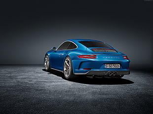 blue Porsche coupe