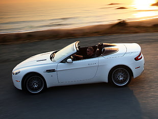time lapse photography of white convertible on road