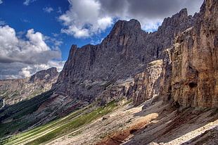 brown rock mountain during cloudy season, rosengarten, dolomites
