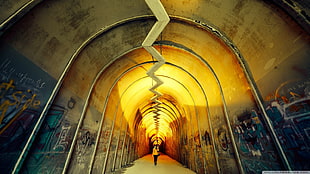 person walking in tunnel, colorful