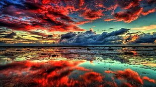 red and gray clouds at sunset