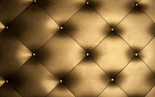 close up photography of tufted brown leather textile HD wallpaper