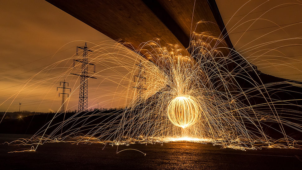 round fire ball design, fire, bridge, motion blur, circle HD wallpaper