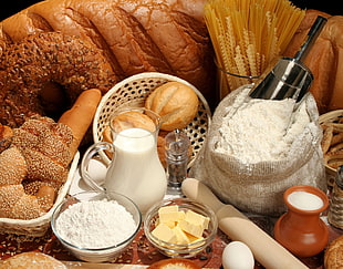 pastries beside white powders, cheese bars and milk in jar photo0