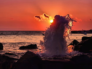 sea wave during golden hour HD wallpaper