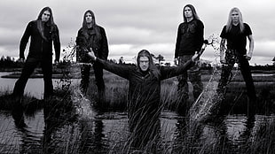 grey scale photo of band
